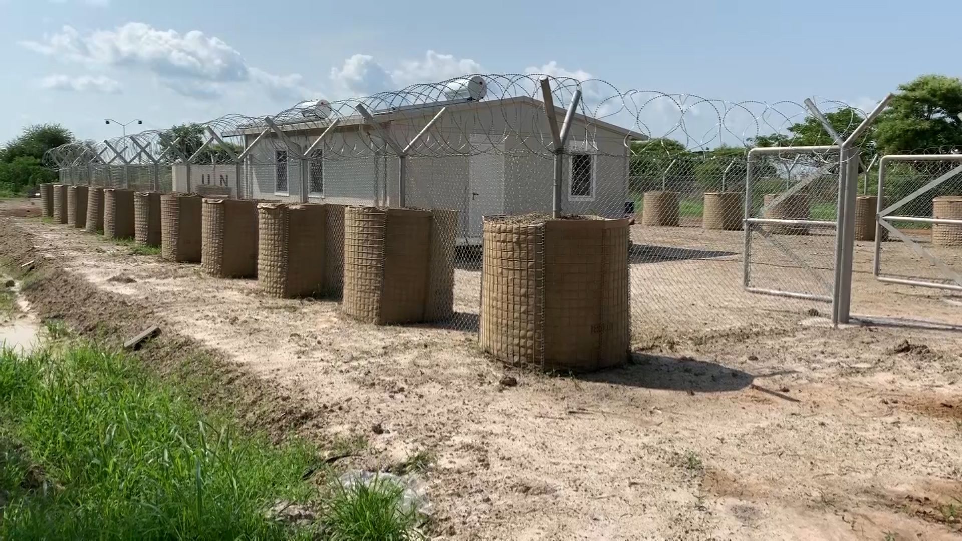 Some of the poles in Malakal are now secured by soil instead of concrete.